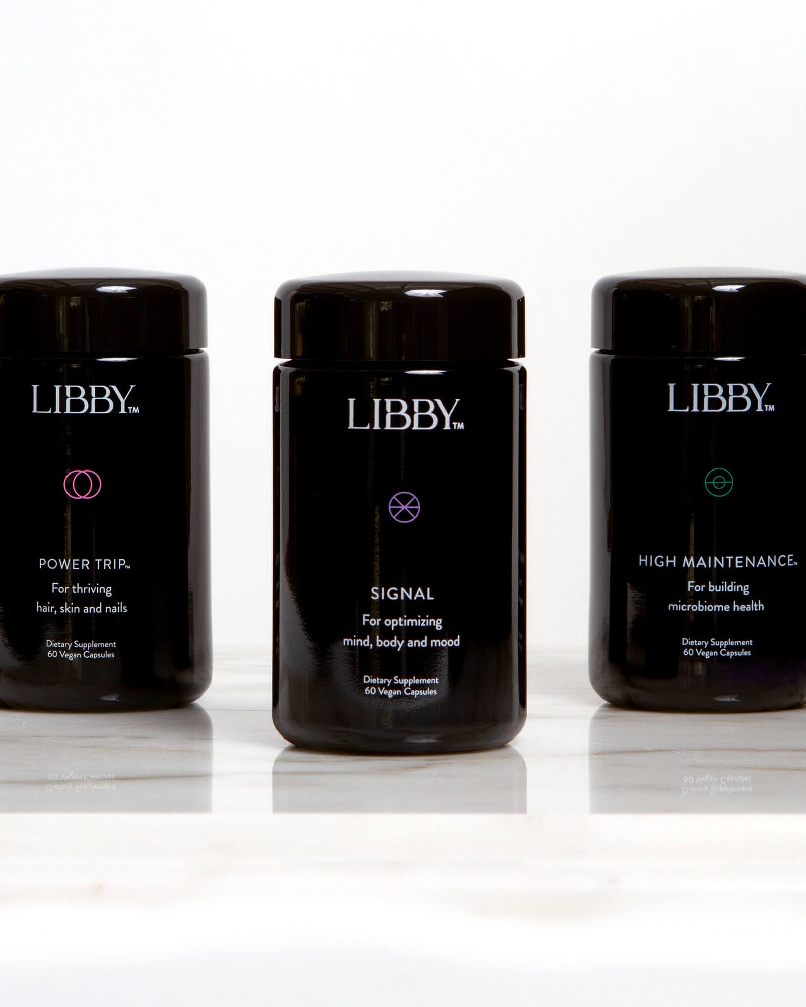 The 90-day Libby System for restoring the foundation of improved vitality and health-three premium black bottles.