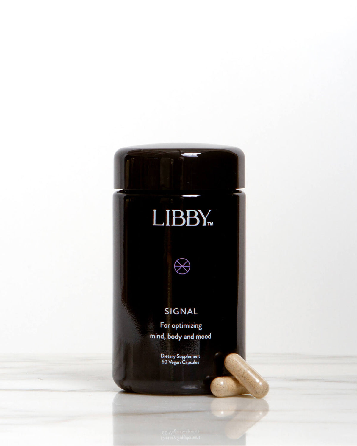 Signal supplement from Libby for optimizing mind, body and mood. Premium black bottle.